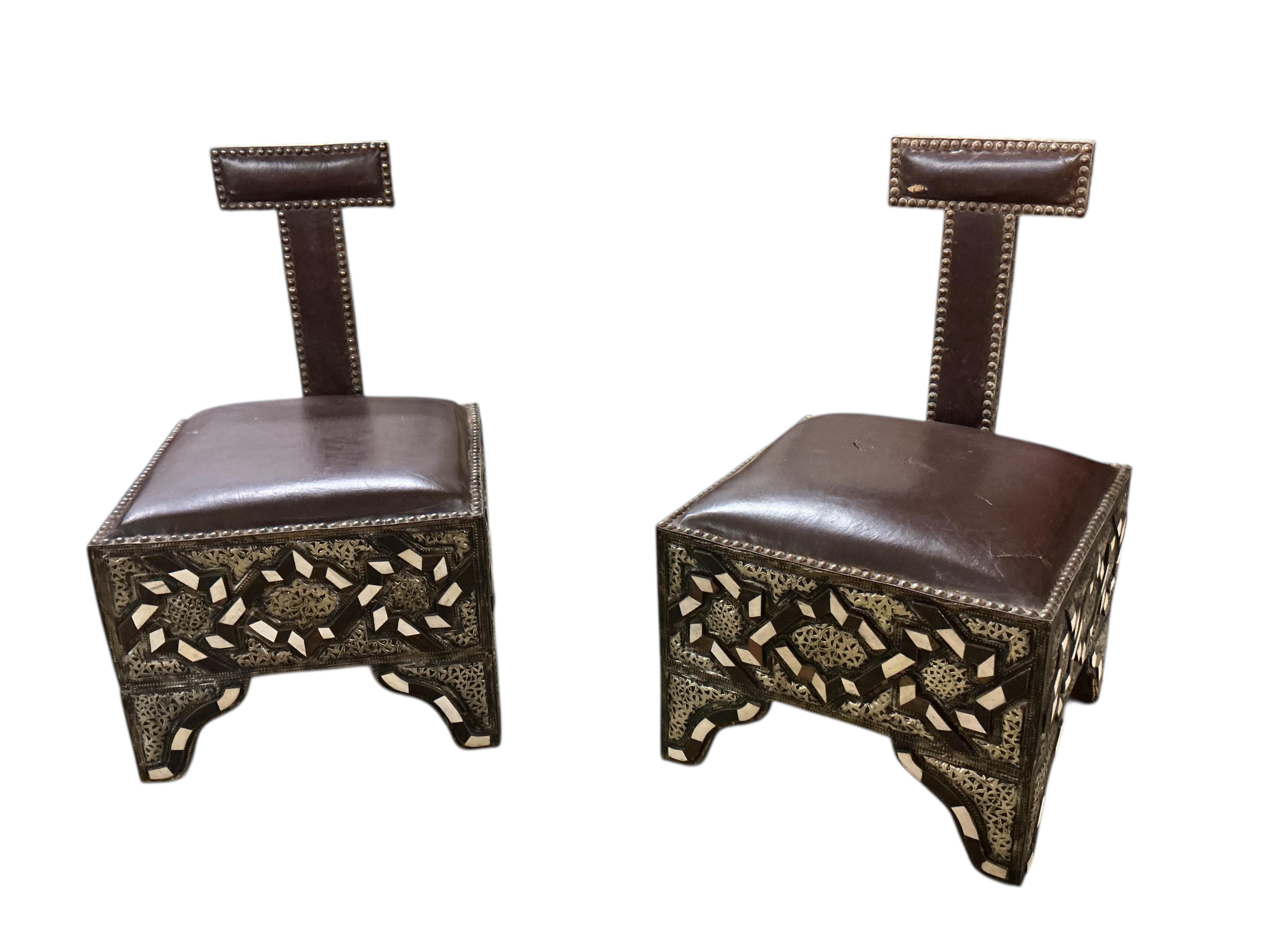 A pair of 20th century Moroccan Berber bone, horn and repousse metal chairs with seats, width 45cm, depth 45cm, height 75cm